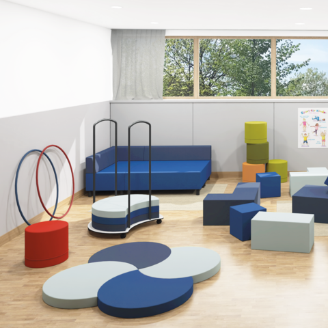 Lernbereich mit spielerisch platzierten Polsterelementen
